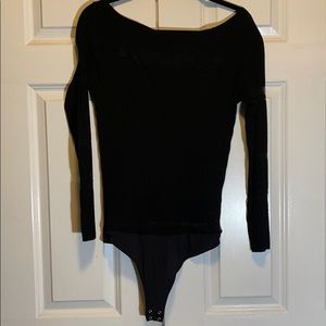 Jennifer Lopez stretch body suit.